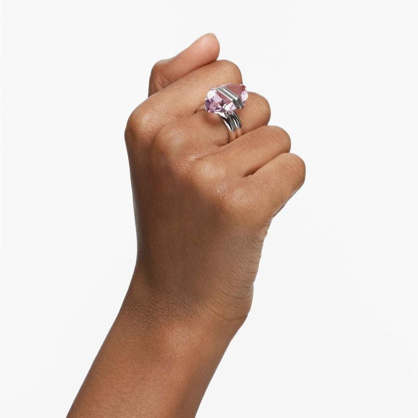 Swarovski Lucent Magnetic Ring in pink with rhodium plating, featuring a sleek, modern design and smooth finish.