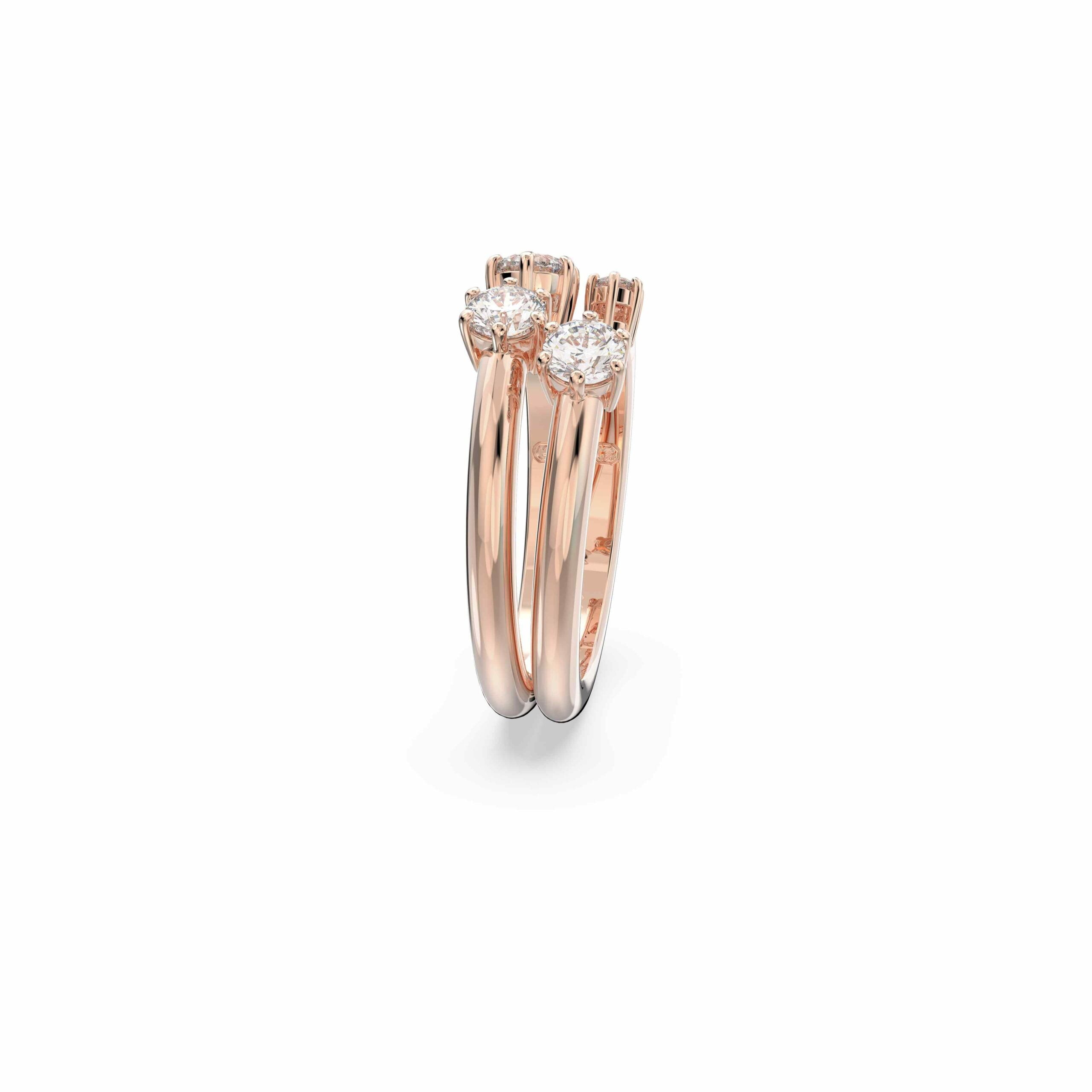 Swarovski Constella ring set with two white round-cut stones in rose-gold plated bands, elegant jewelry for special occasions.