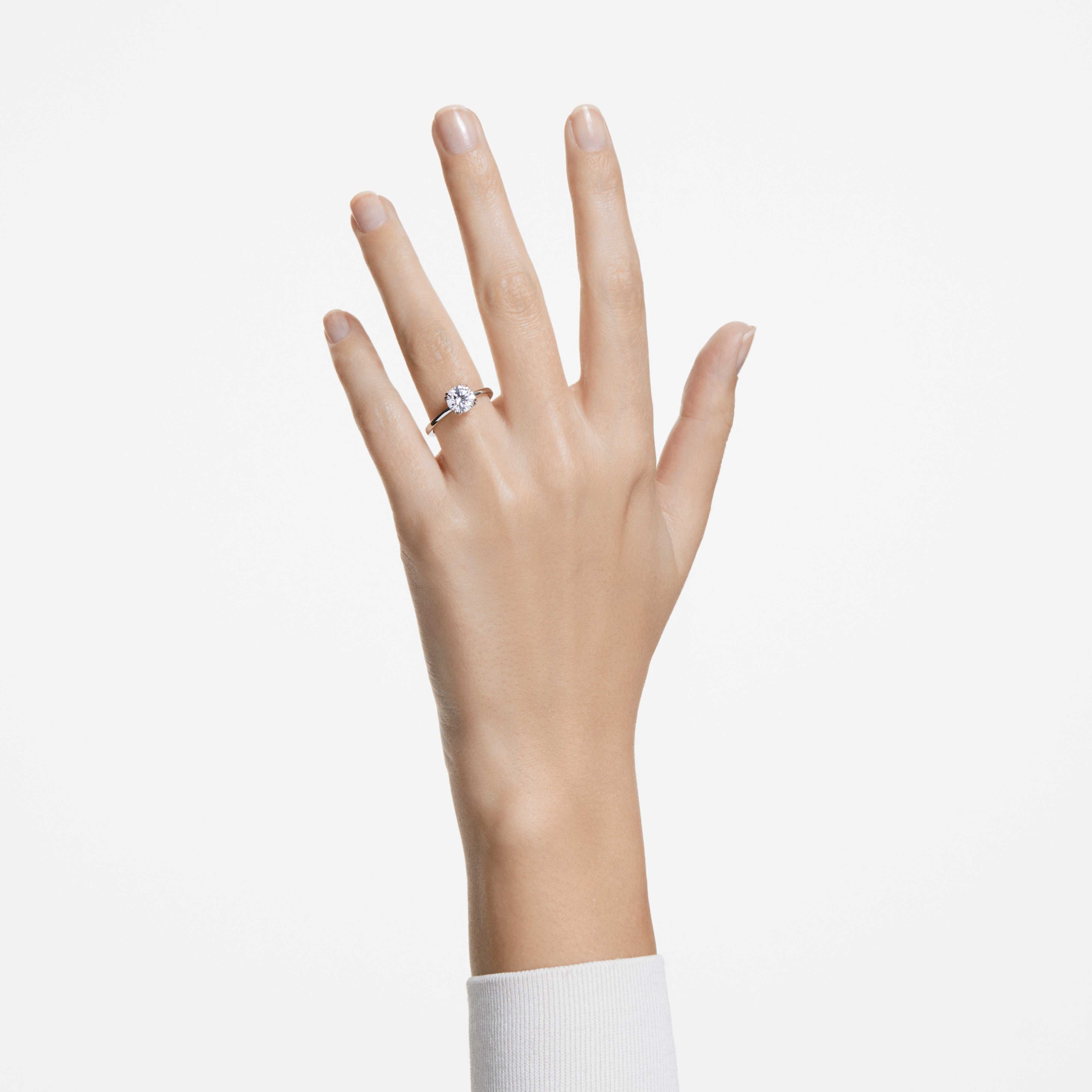Swarovski Stilla cocktail ring with round white crystal and rhodium-plated band, elegant jewelry accessory.