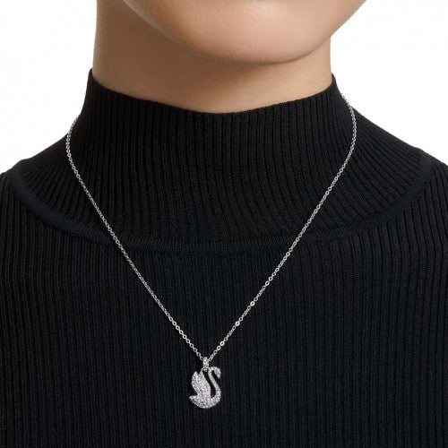 Swarovski Iconic Swan pendant necklace with crystal accents, featuring a sleek, elegant design on a delicate chain.