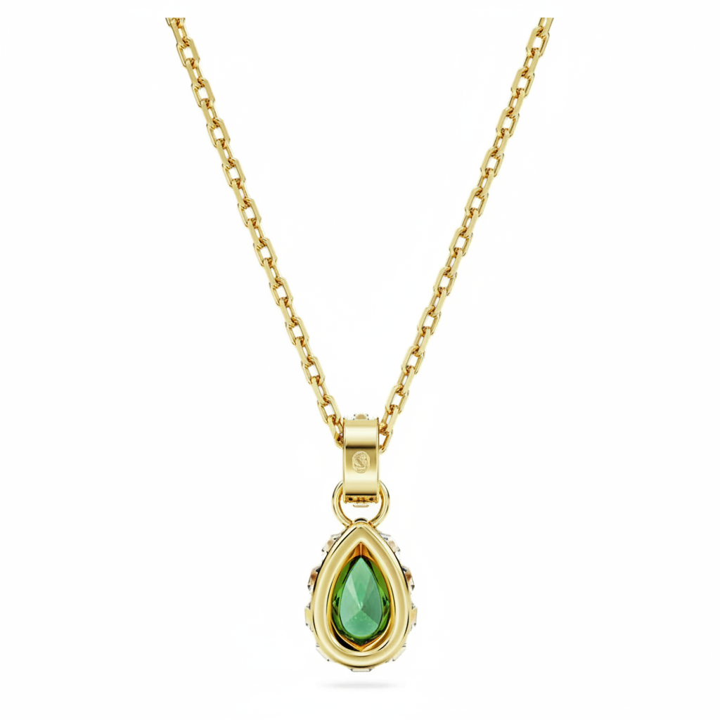 Green Swarovski Chroma pendant with pear-cut crystal, gold-tone plated setting, showcasing elegant jewelry design.