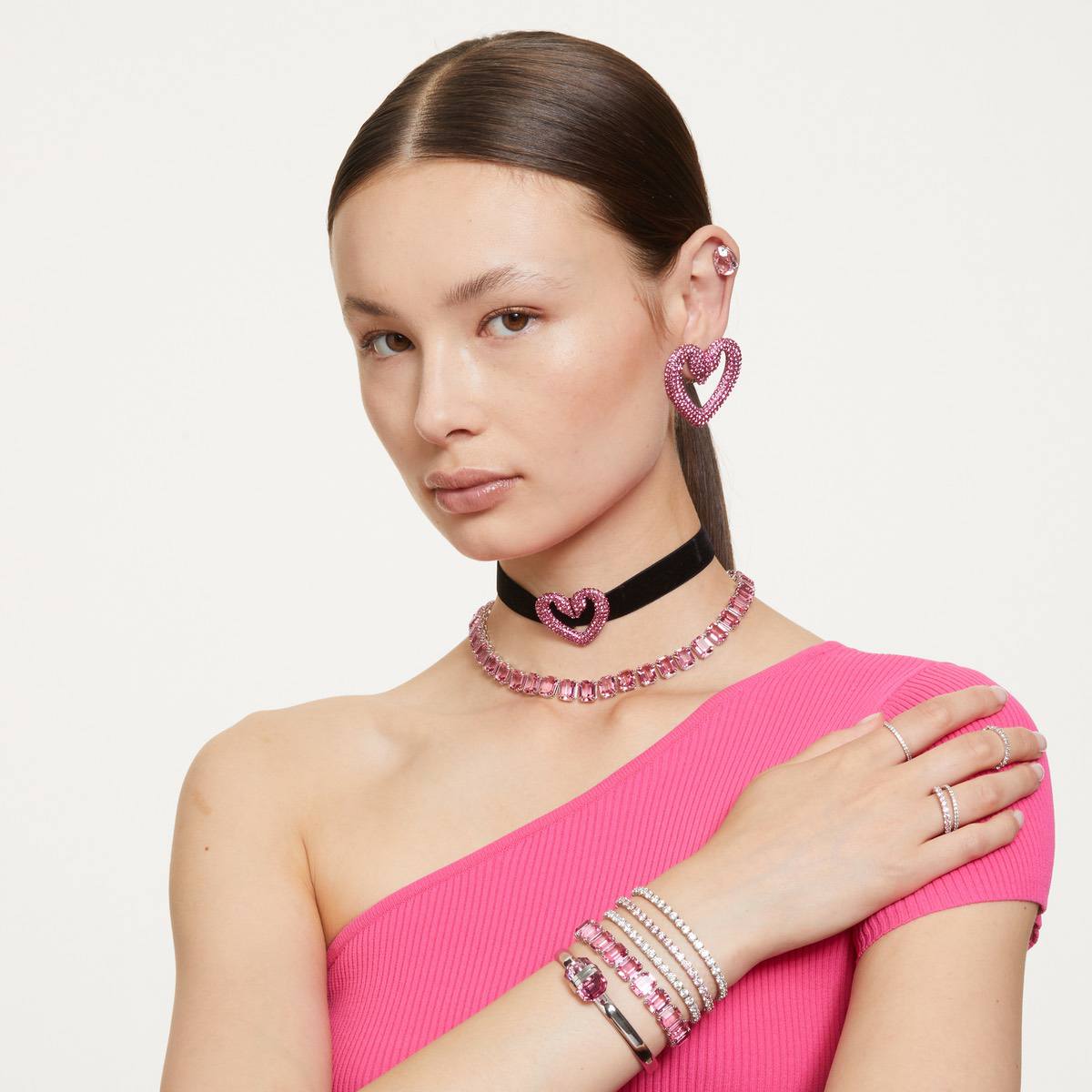 Swarovski Matrix tennis bracelet with round pink crystals and rhodium plating, elegant jewelry accessory.
