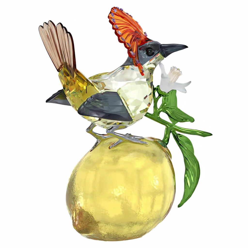 Swarovski Idyllia Royal Flycatcher crystal figurine with intricate detailing and vibrant colors on a clear glass base.