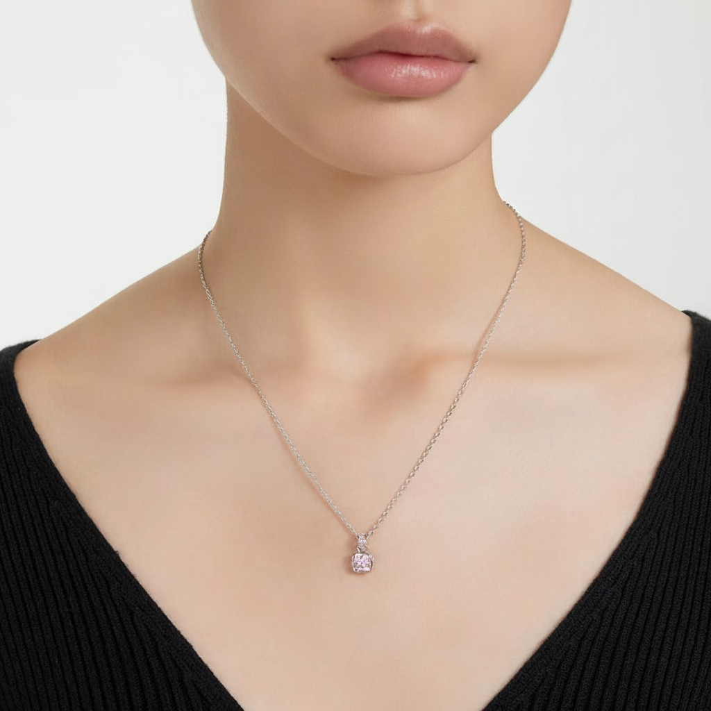 Swarovski June birthstone pendant with pink square-cut crystal, rhodium-plated jewelry piece with a sleek, modern design.