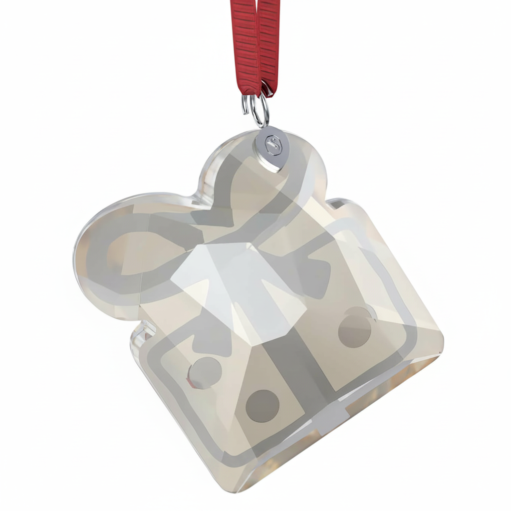 Swarovski Holiday Cheers gingerbread gift ornament with sparkling details and festive design, ideal for holiday decoration.