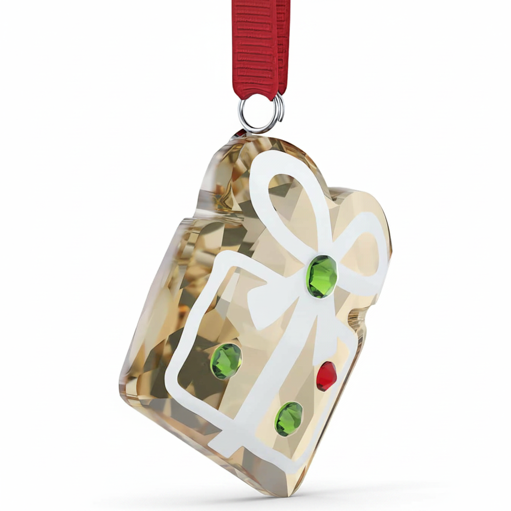 Swarovski Holiday Cheers Gingerbread Gift Ornament with sparkling details and festive design hanging on a holiday tree