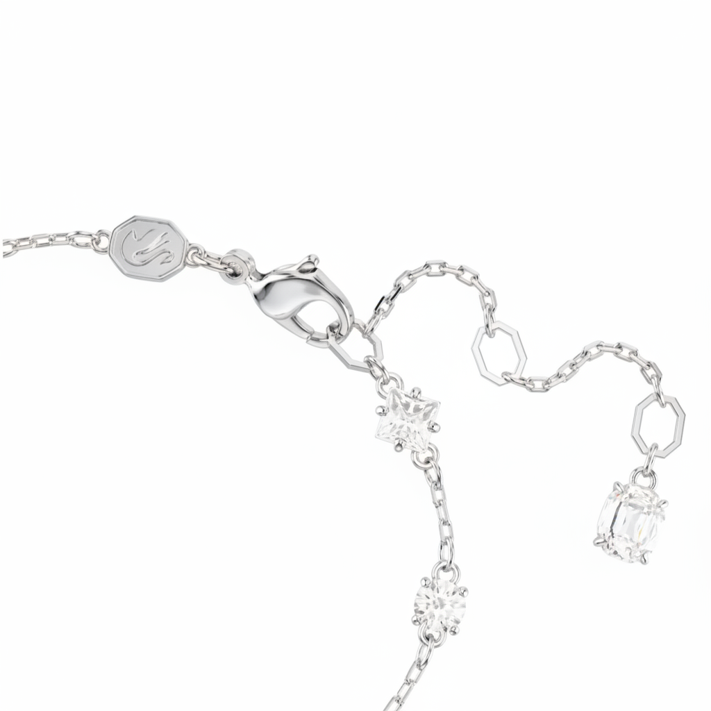Swarovski Mesmera bracelet with mixed cut crystals, scattered design, white rhodium plating, showcasing elegant jewelry craftsmanship.
