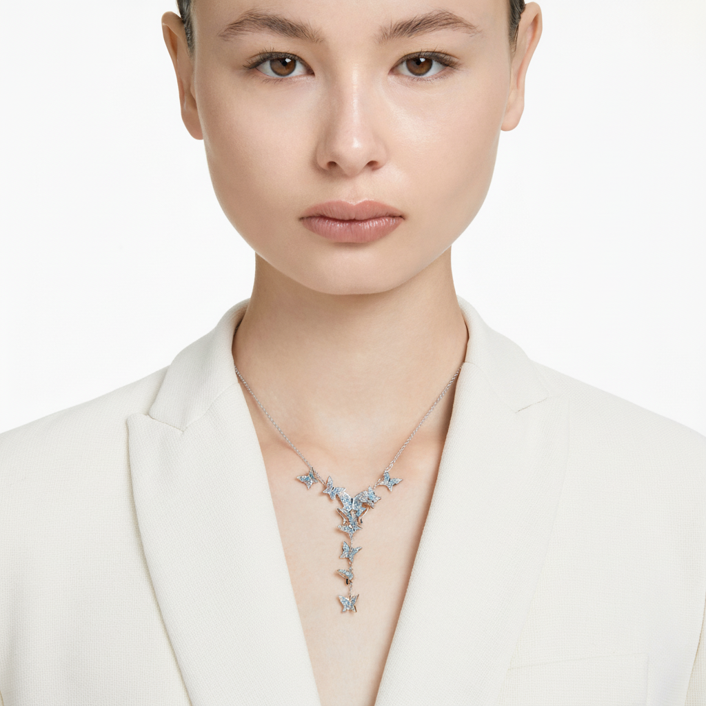 Swarovski Idyllia Lilia Y necklace with butterfly pendant in blue and rhodium-plated finish, showcasing elegant jewelry design
