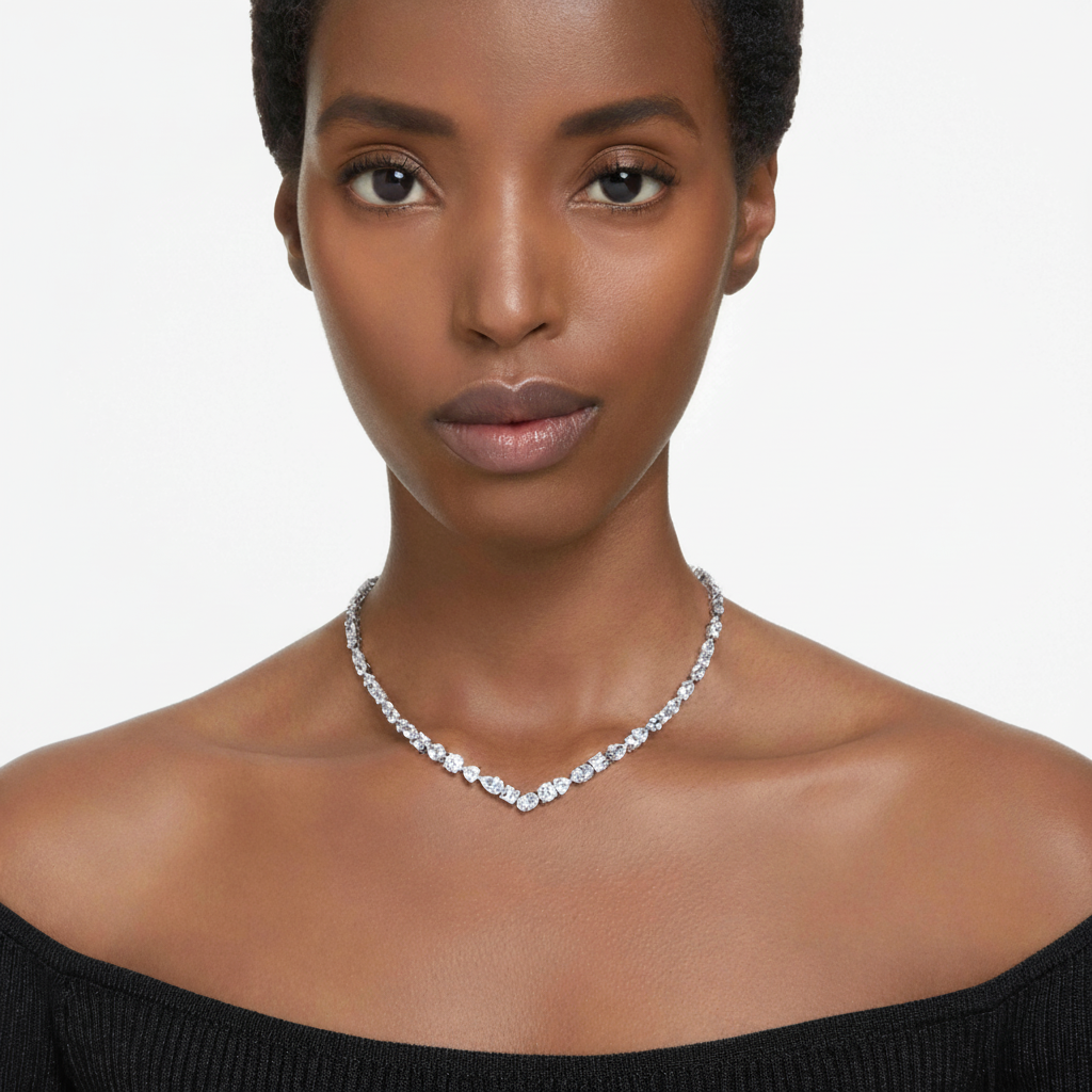 Swarovski Mesmera necklace with mixed cut white crystals, rhodium plated for a sleek, elegant jewelry look.