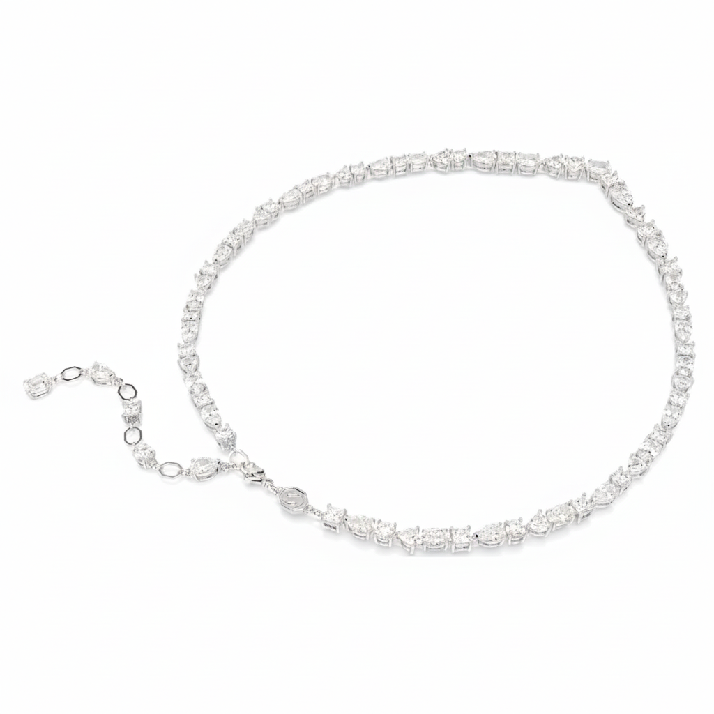 Swarovski Mesmera necklace with mixed cut white crystals, rhodium-plated chain, and elegant design.