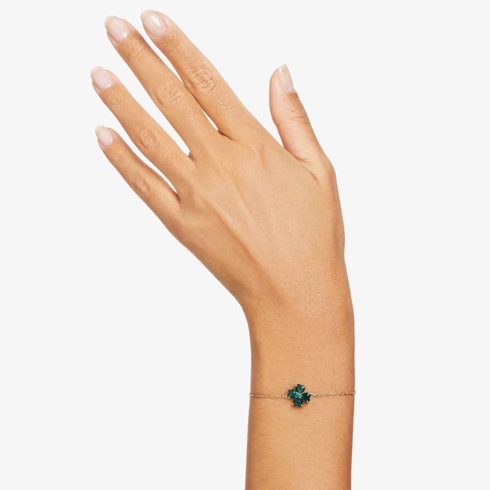 Swarovski Idyllia bracelet with mixed cut green clover-shaped crystals in gold-tone plating, elegant jewelry accessory