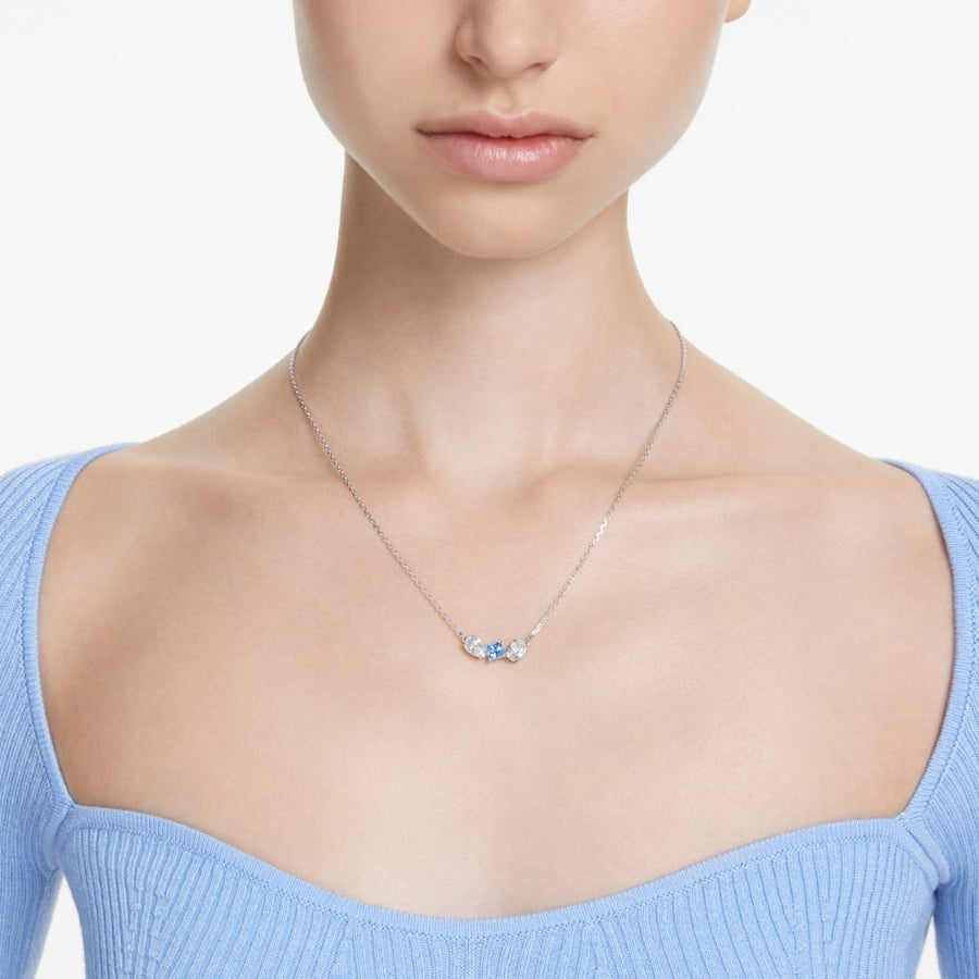 Swarovski Mesmera blue pendant with mixed cut crystals and rhodium plating, showcasing a sparkling, elegant jewelry piece.