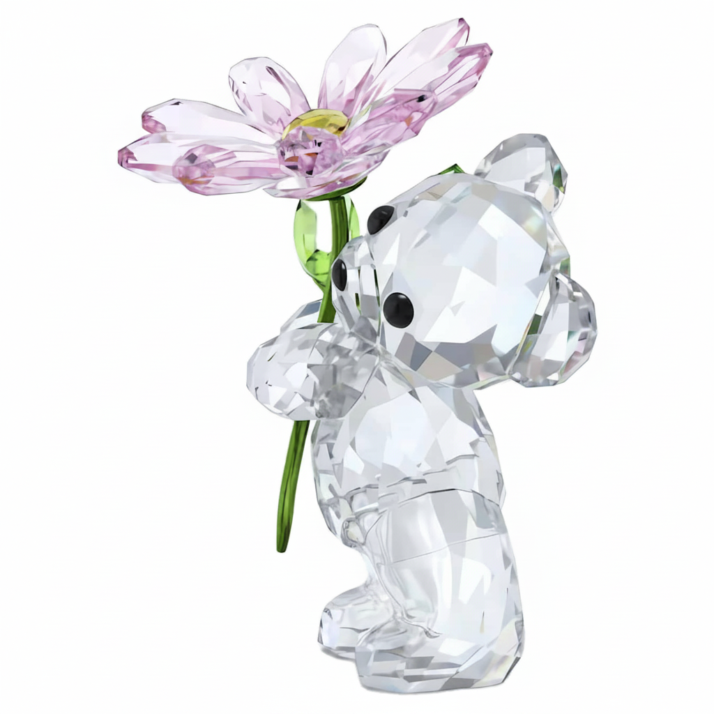 Swarovski Kris Bear holding a daisy flower, detailed crystal figurine with sparkling accents and a cute bear design.