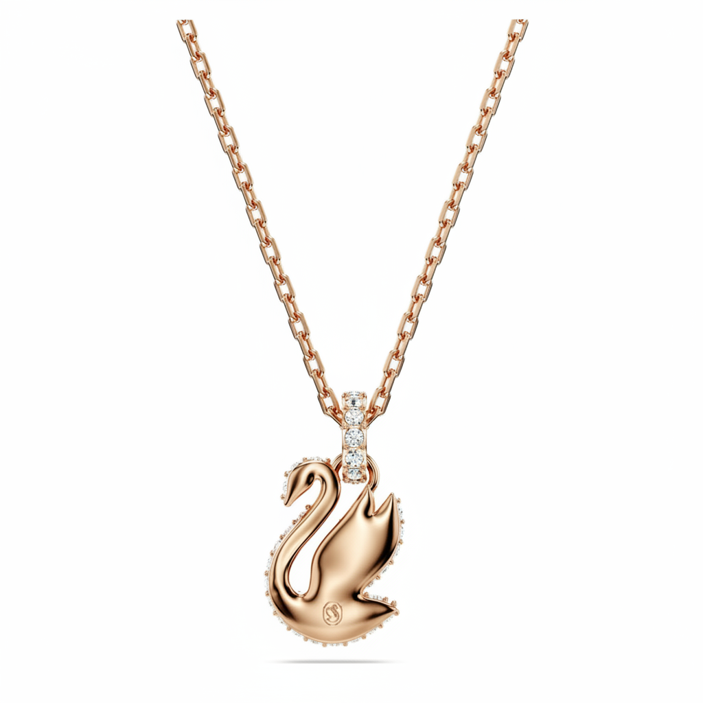 Small black Swarovski Swan pendant with rose gold-tone plating, featuring intricate detailing and a elegant, shiny finish.