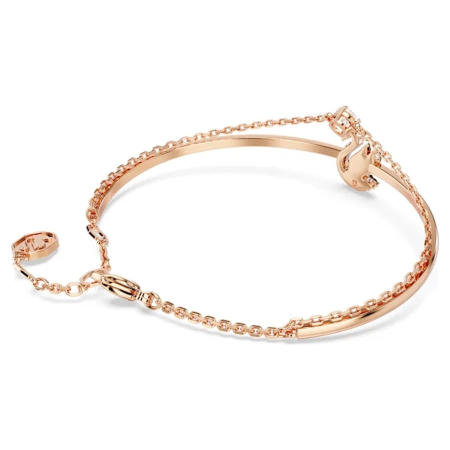 Swarovski black swan figurine with rose gold-tone plated accents, detailed crystal craftsmanship, and elegant design.