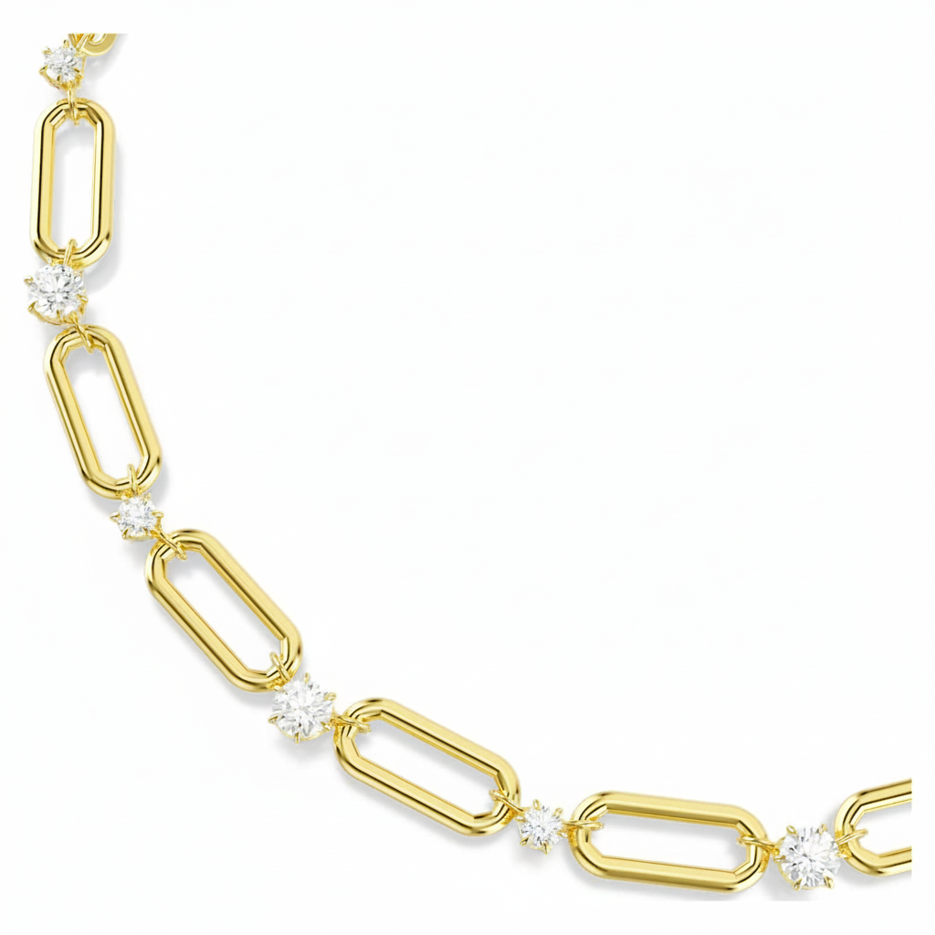 Swarovski Constella necklace with white crystals and gold-tone plating, elegant jewelry piece showcasing sparkling design.