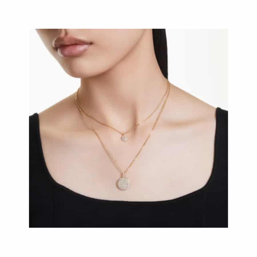 Swarovski Sublima layered pendant in white with gold-tone plating, featuring elegant, sparkling crystal design.