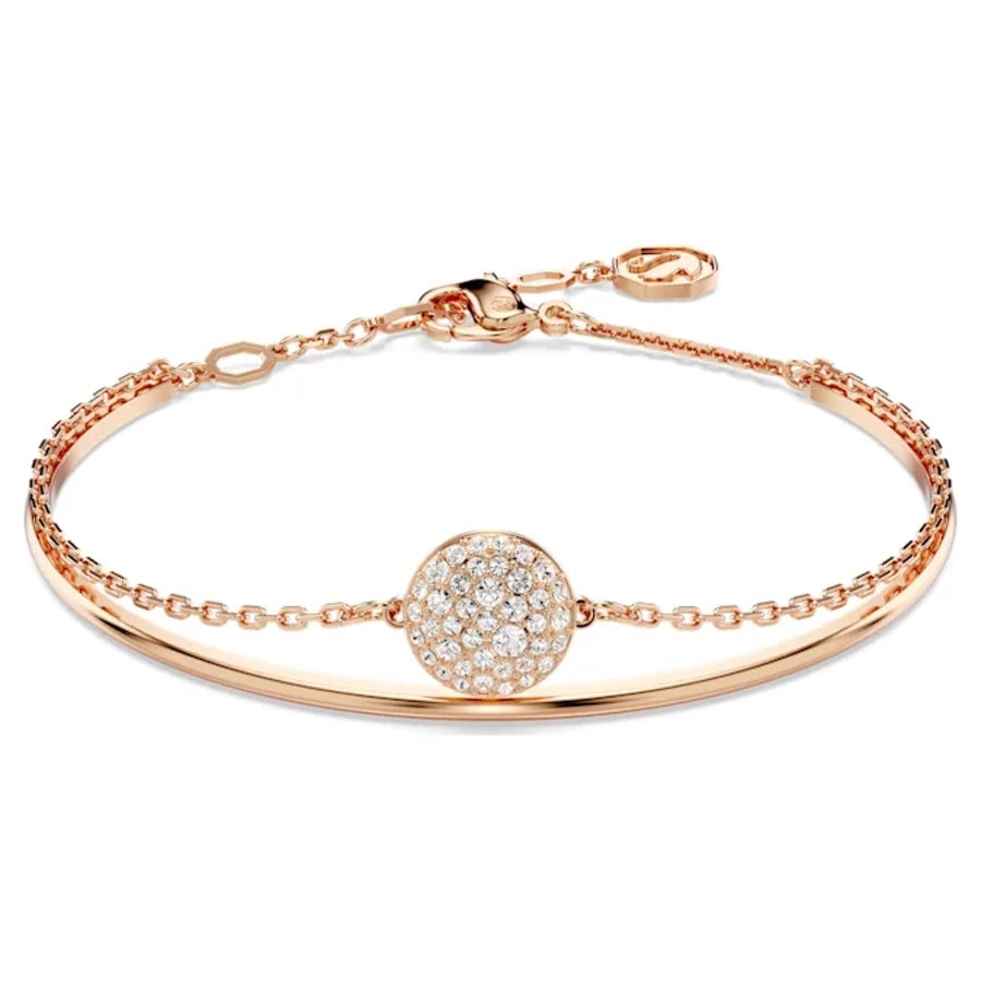 Swarovski Meteora bangle in white with rose gold-tone plating, featuring elegant design and sparkling crystal accents.
