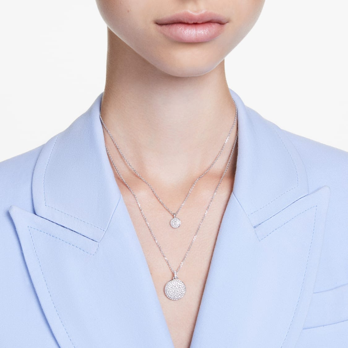 Swarovski Meteora layered pendant in white with rhodium plating, featuring sparkling crystal accents and elegant design.