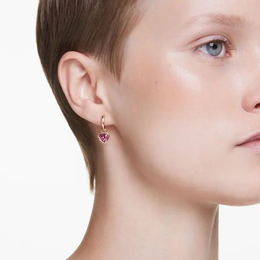 Swarovski Chroma Drop Earrings featuring colorful crystal drops and silver-tone hooks on a plain background.
