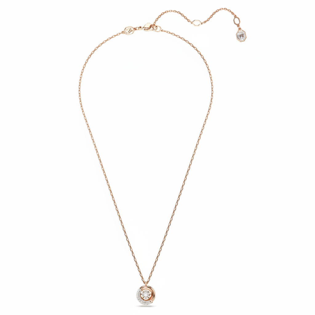 Swarovski Dextera pendant with round white crystal, rose gold-tone plated, featuring elegant jewelry design and sparkling gemstone.