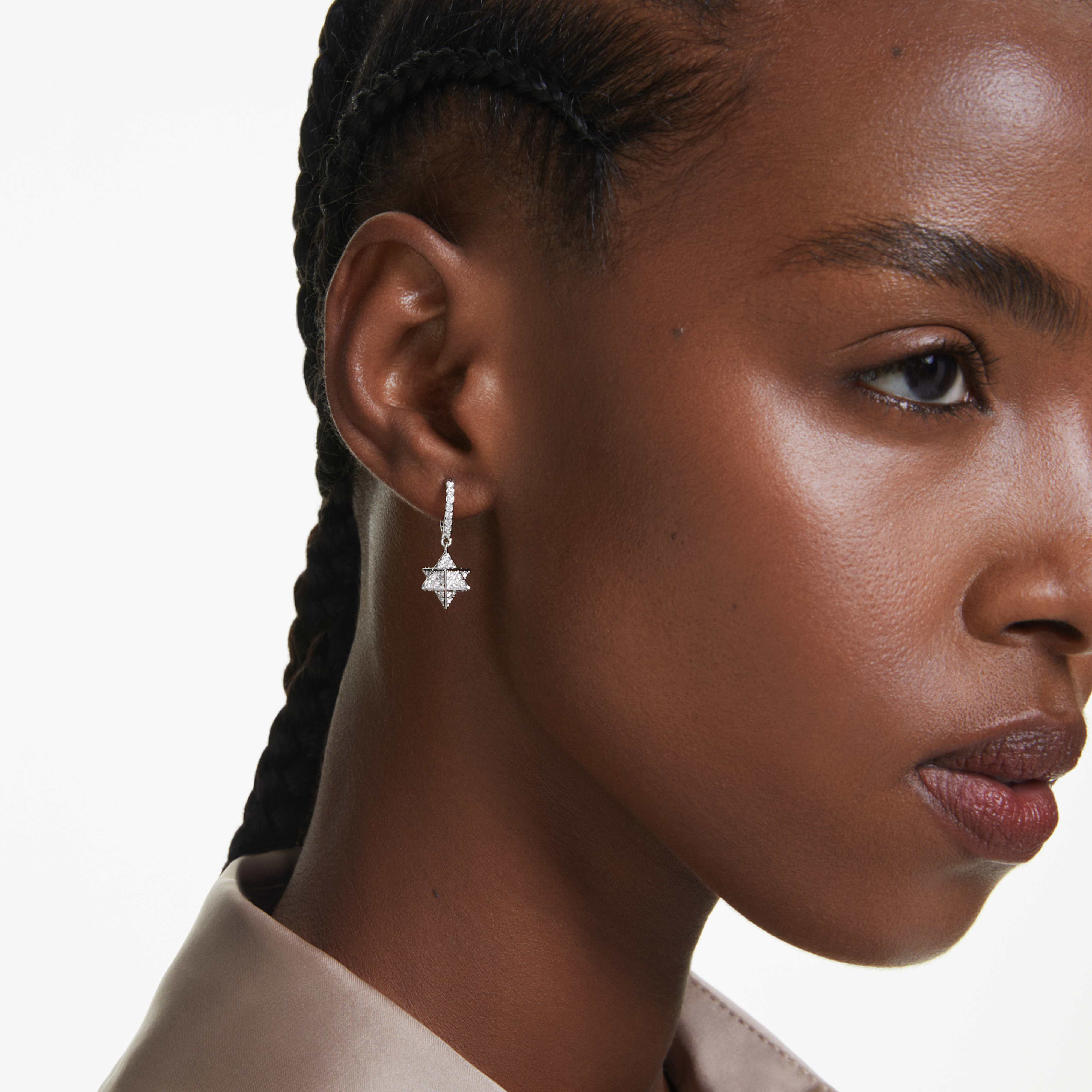 Swarovski Dextera drop earrings with asymmetrical star and sphere designs, round cut crystals, white finish, rhodium plated.