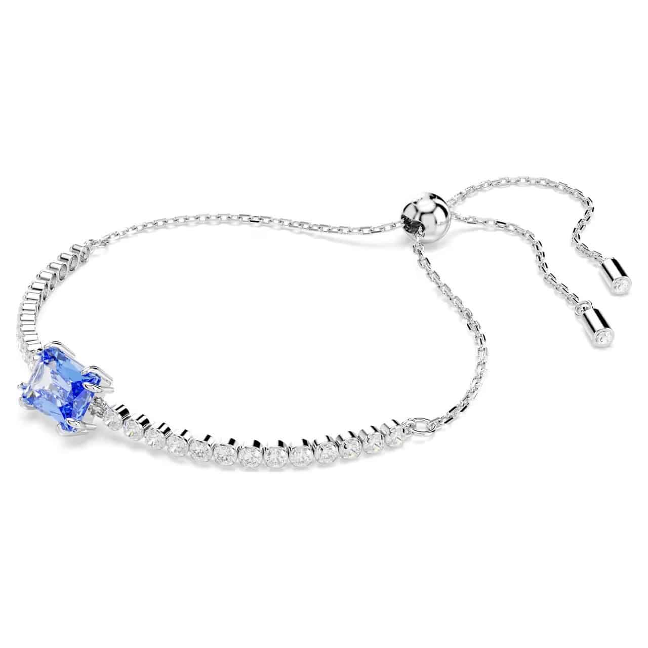 Swarovski Matrix tennis bracelet with blue mixed-cut crystals and rhodium plating, showcasing an elegant and sparkling jewelry piece.