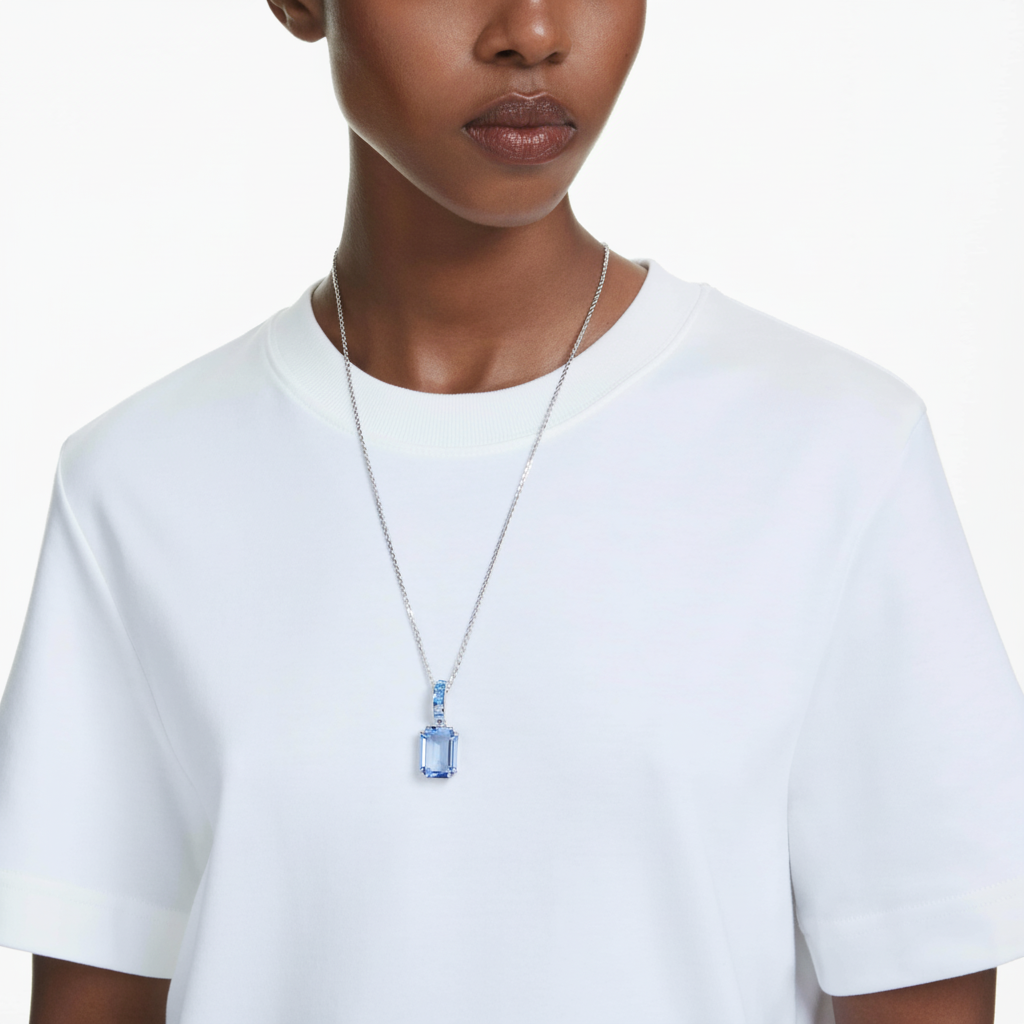 Swarovski Millenia pendant with octagon-shaped blue crystal, rhodium-plated silver setting, elegant jewelry accessory