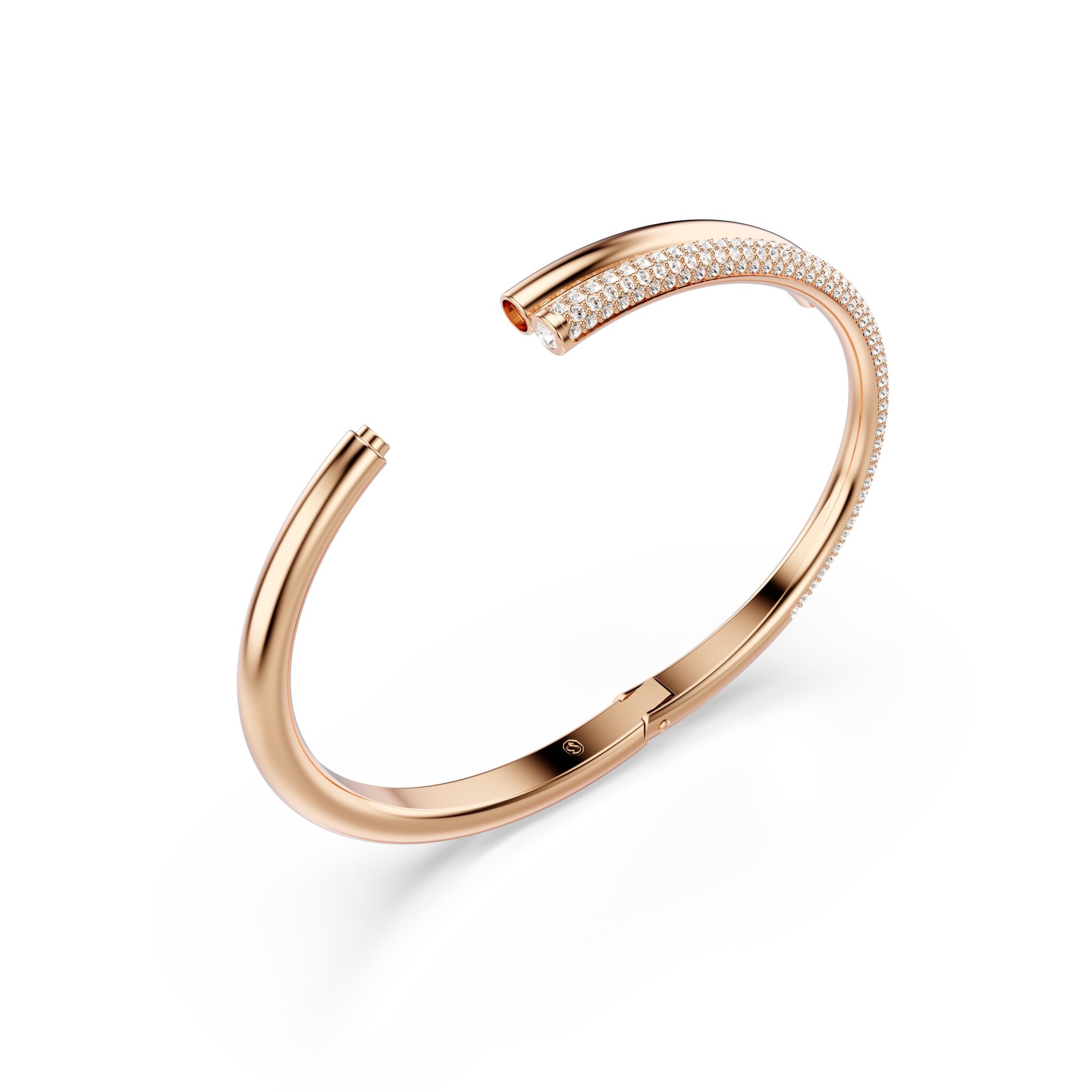 Swarovski Dextera bangle with rose gold-tone plating and magnetic closure, featuring white accents and elegant design.