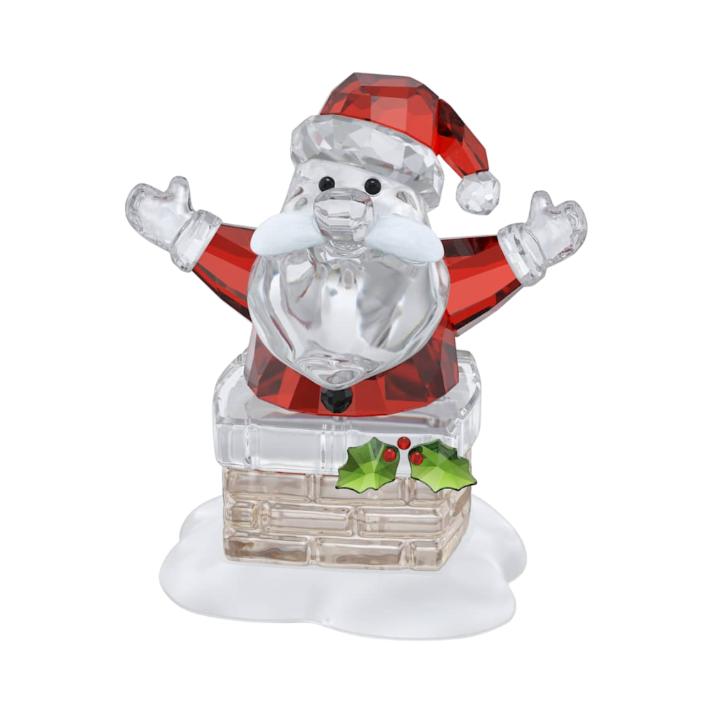 Swarovski Holiday Cheers Santa Claus figurine sitting on a chimney with festive details and sparkling crystal accents.