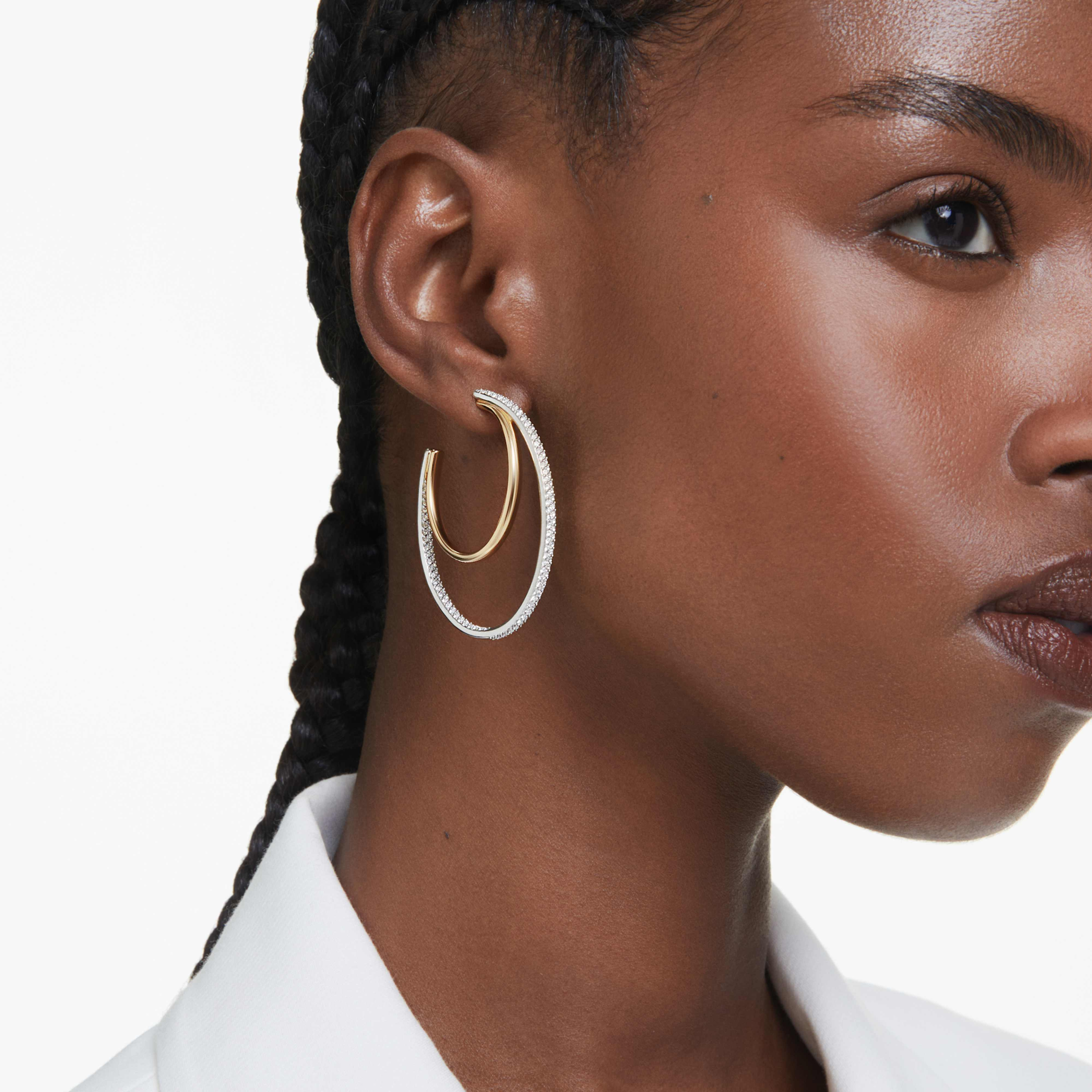 Swarovski Hyperbola Hoop Earrings with round cut white crystals, medium size, mixed metal finish, elegant jewelry accessory