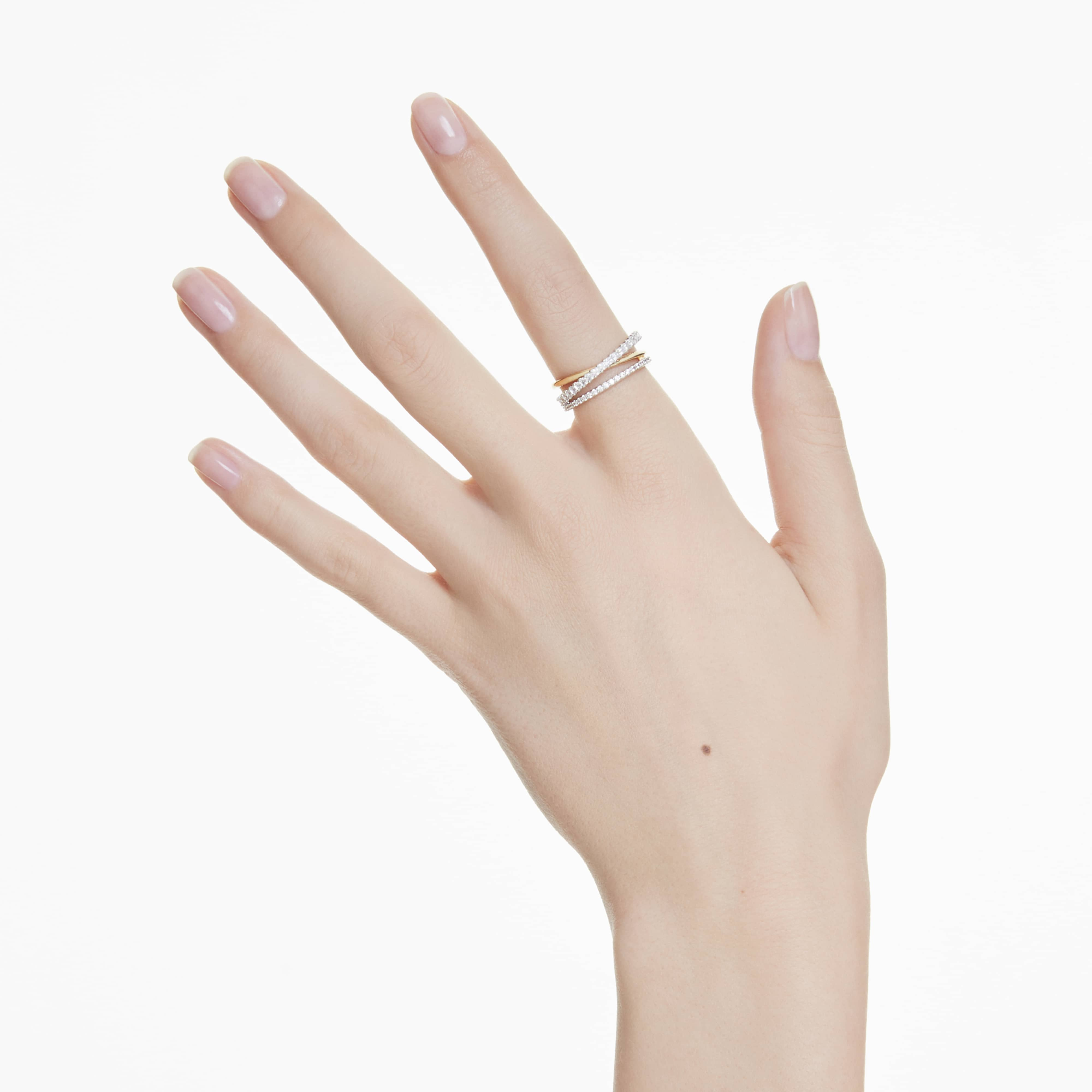 Swarovski Hyperbola ring with mixed cuts and white gemstones in a mixed metal finish, showcasing a modern, elegant design.