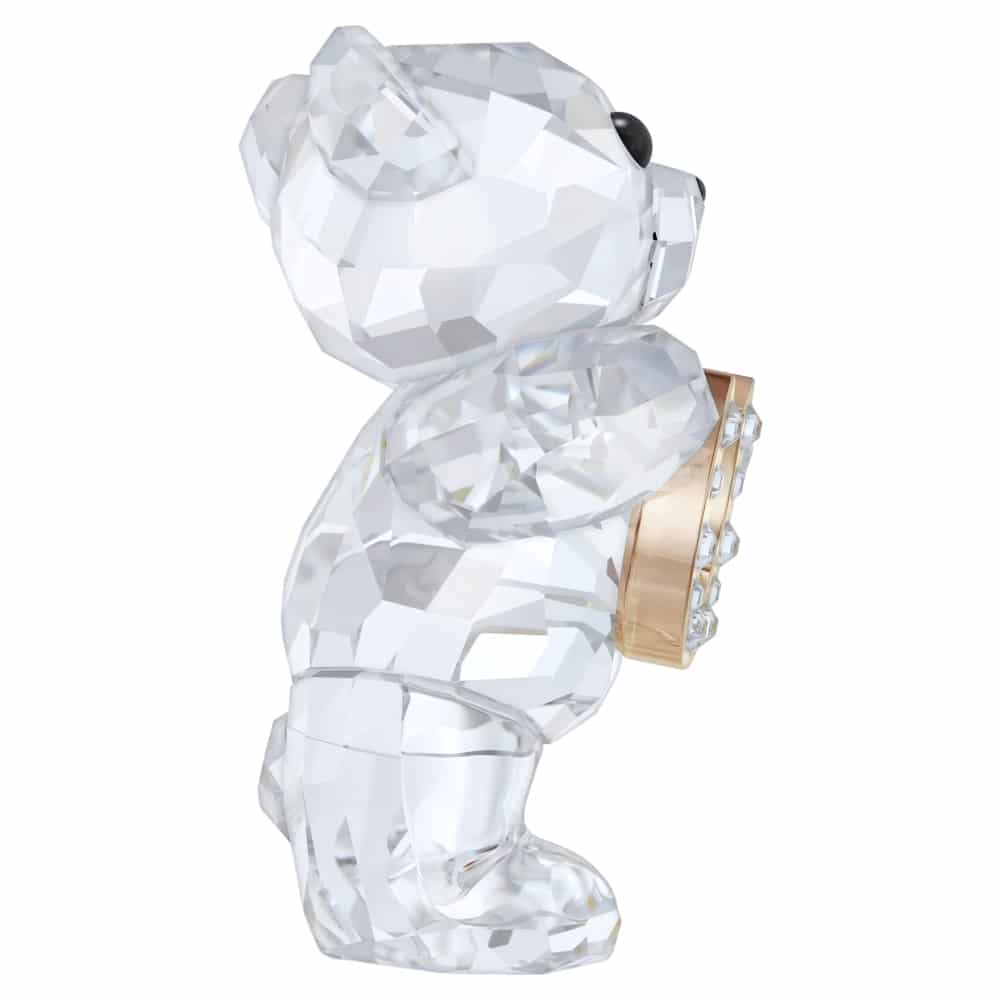 Swarovski Kris Bear figurine with a gold horseshoe, featuring sparkling crystal details and adorable bear design.