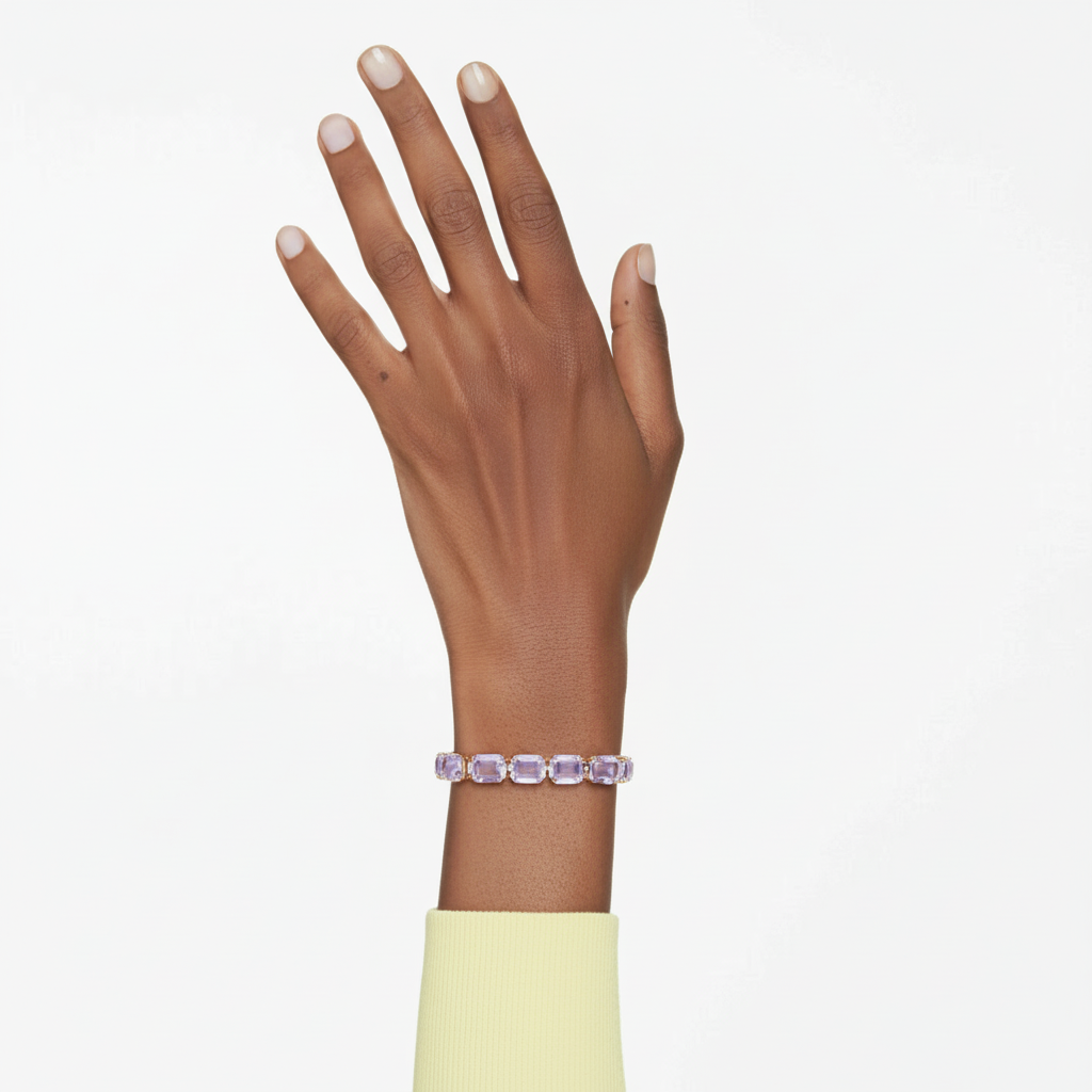 Swarovski Millenia tennis bracelet featuring sparkling crystal stones set in a sleek metal design.