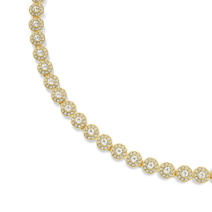 Swarovski Una Angelic jewelry set with round-cut white crystals and gold-tone plated accents, includes necklace and earrings.