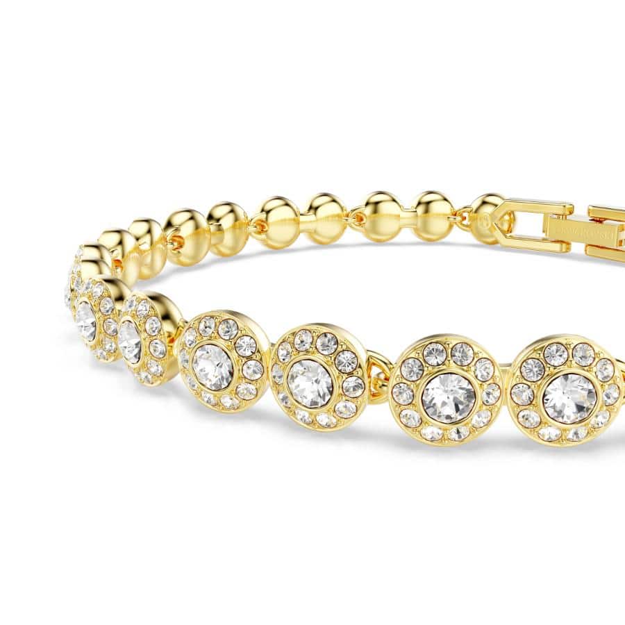 Swarovski Una Angelic jewelry set featuring round-cut white crystals with gold-tone plated design and intricate detailing.