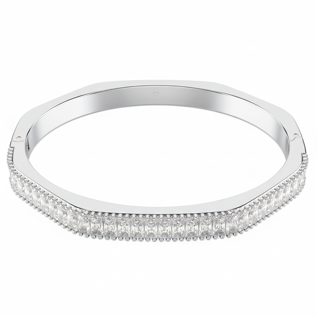 Swarovski Matrix Bangle featuring sparkling crystal stones set in a sleek silver-tone metal bracelet.