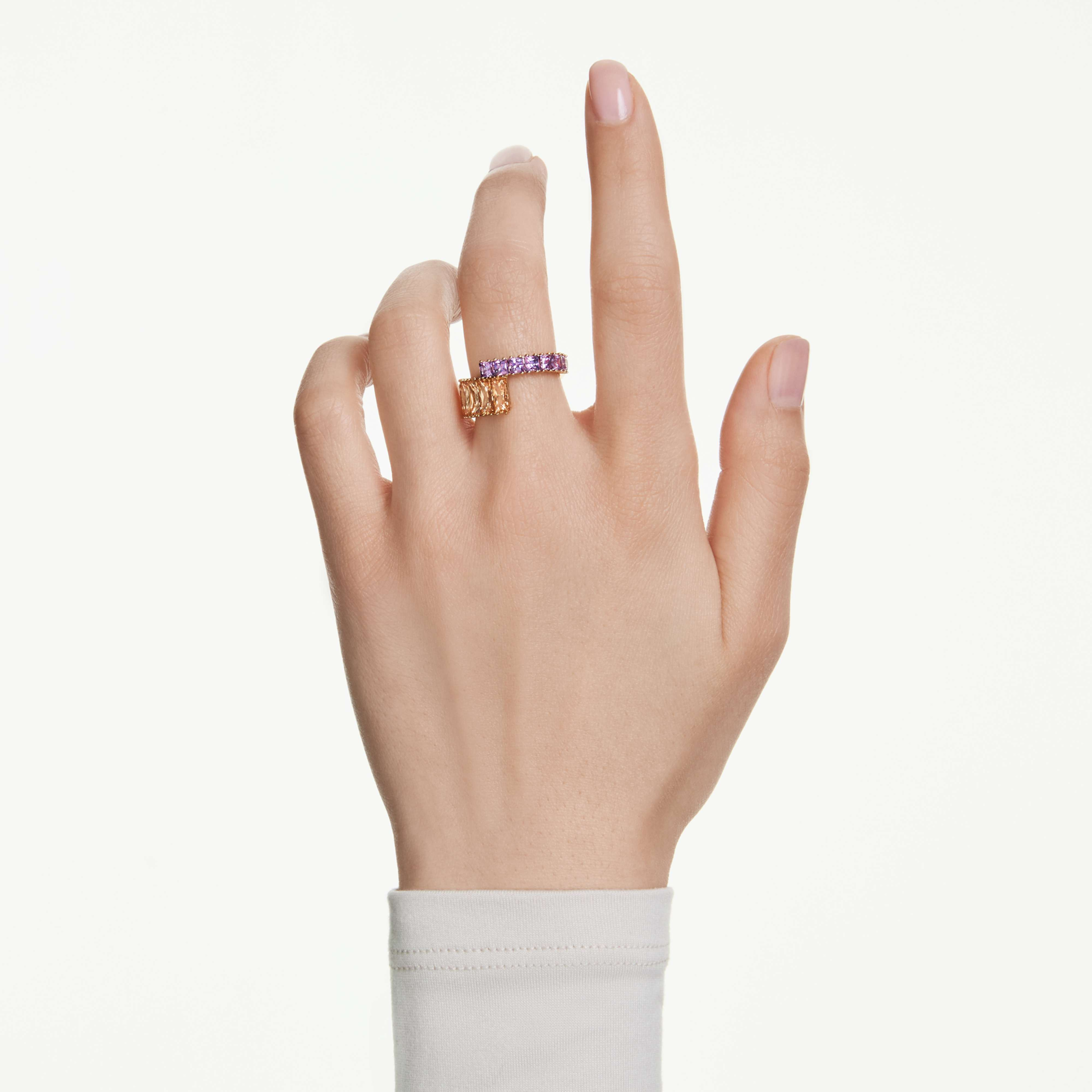 Swarovski Matrix ring with multicolored mixed cut crystals and gold-tone plating, showcasing a modern, stylish jewelry design.