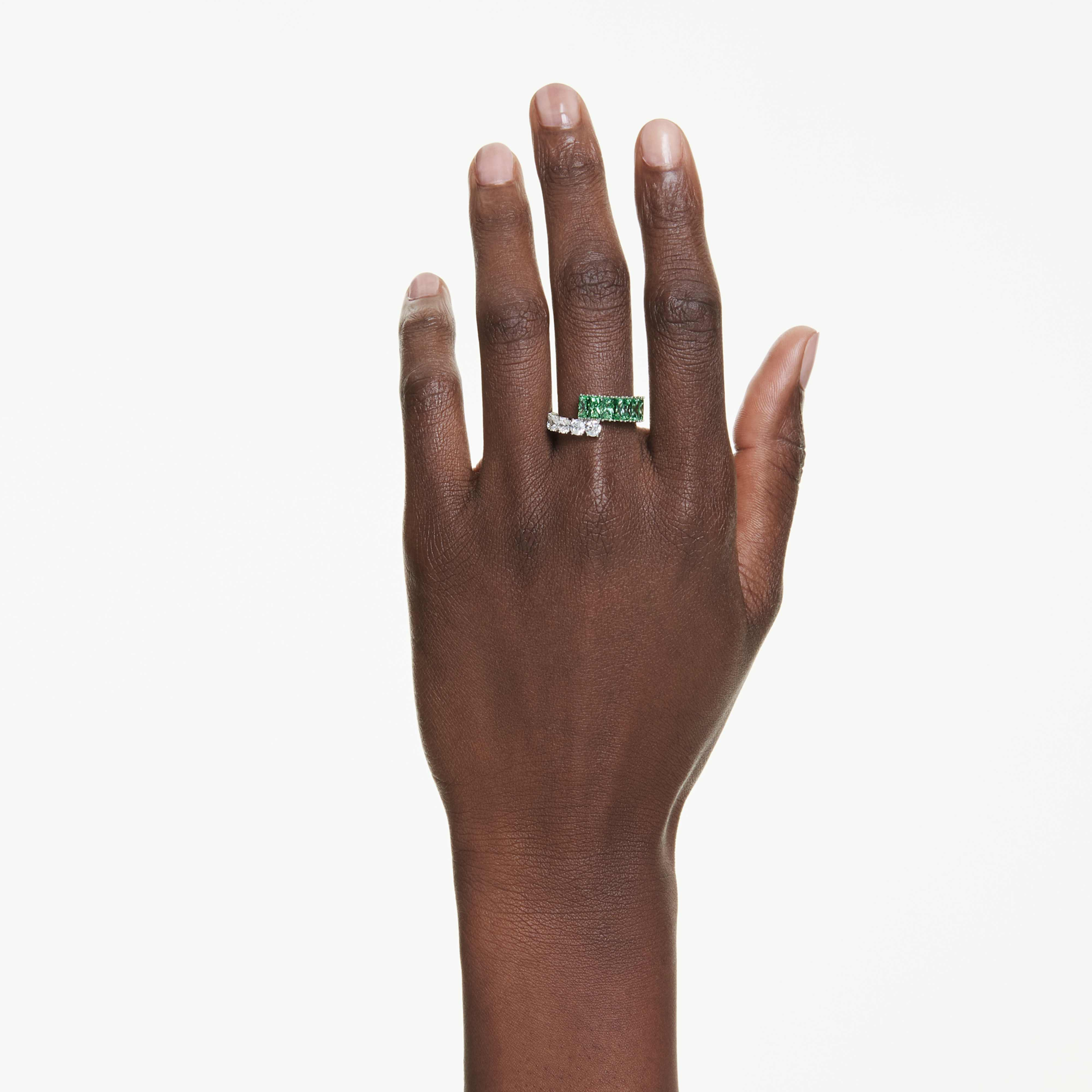 Swarovski Matrix ring with green mixed-cut crystals and rhodium plating, showcasing a modern, elegant jewelry design.