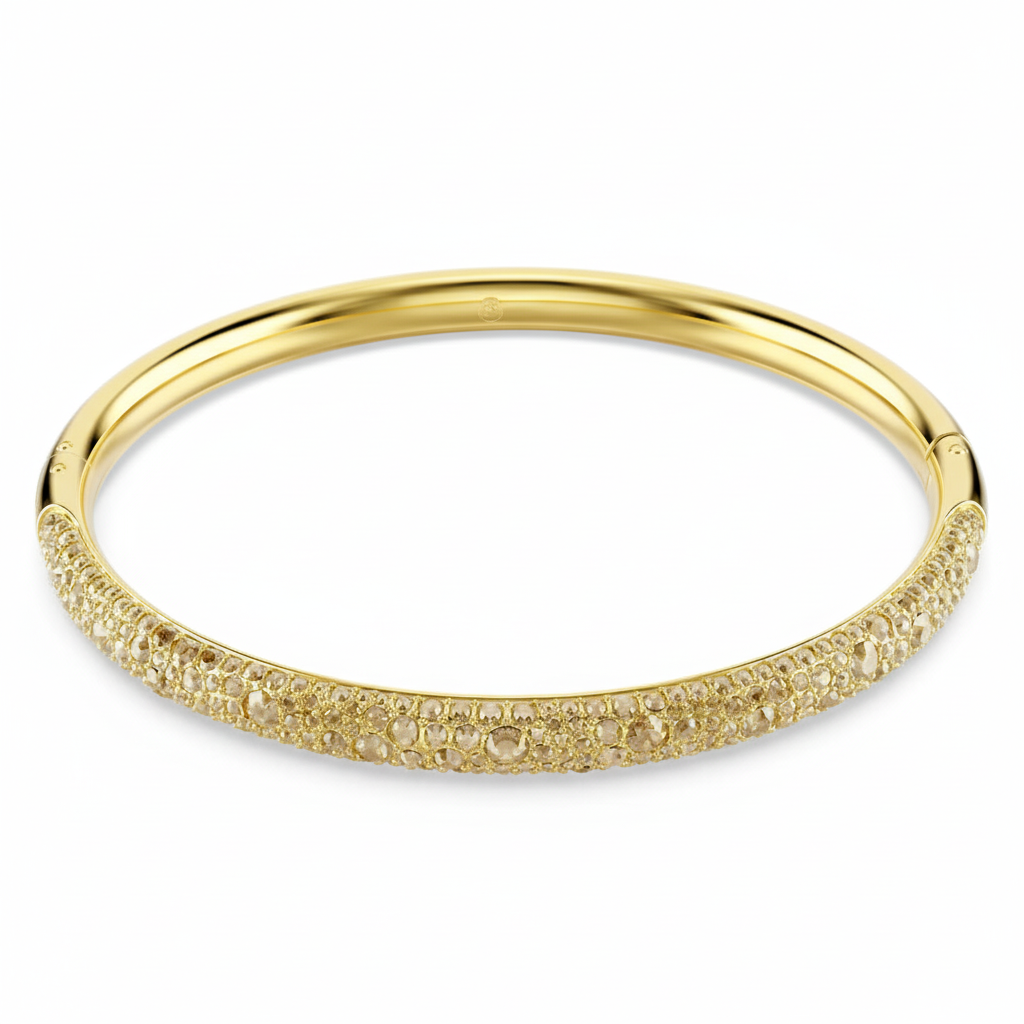 Swarovski Sublima bangle with sparkling clear crystals and elegant silver-tone design on a white background.