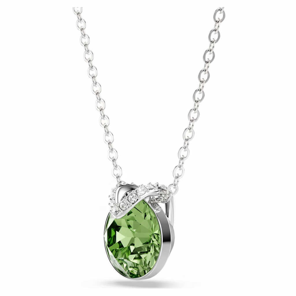 Swarovski Bella V pendant with round green crystal, rhodium-plated setting, showcasing elegant jewelry design and sparkling gemstone.
