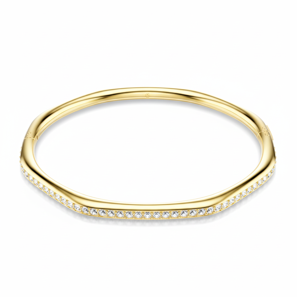 Swarovski Dextera bangle featuring an octagon-shaped white crystal with round cut, gold-tone plated finish.