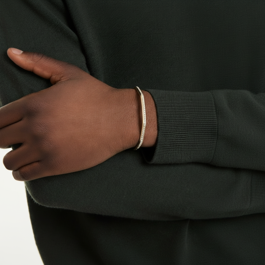 Swarovski Dextera bangle with octagon shape, round cut white crystals, gold-tone plated jewelry accessory.