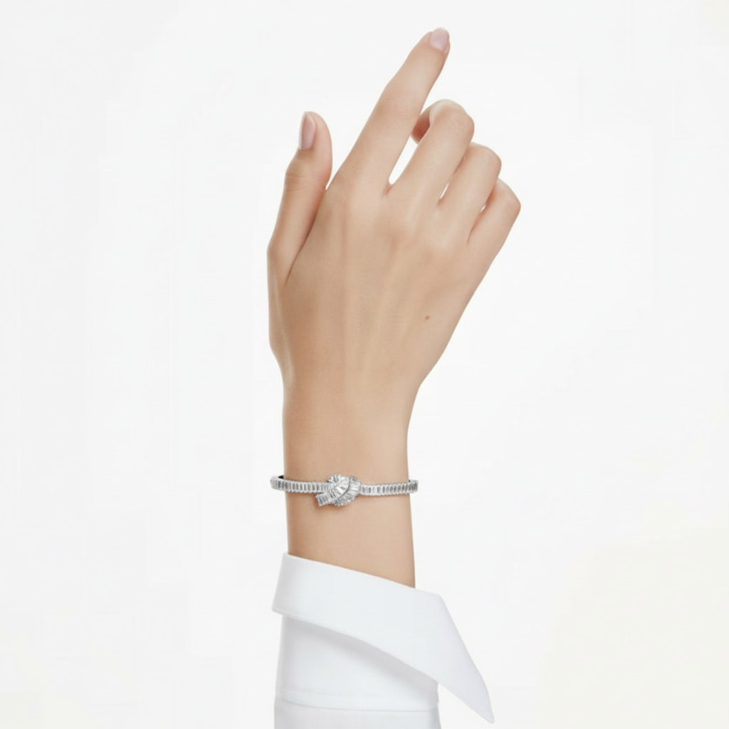Swarovski Matrix bangle featuring sparkling crystal accents and sleek silver-tone design for elegant wristwear.