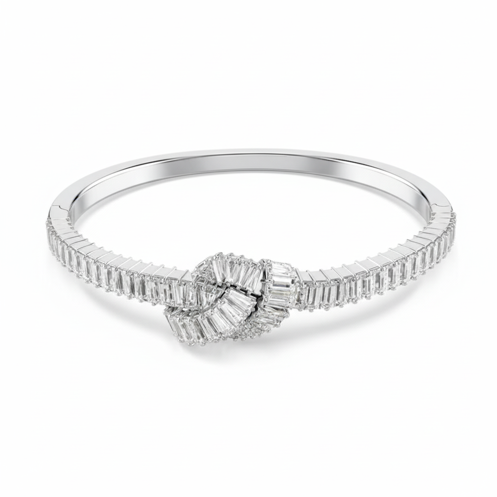 Swarovski Matrix Bangle featuring sparkling crystal accents and a sleek silver-tone metal design.