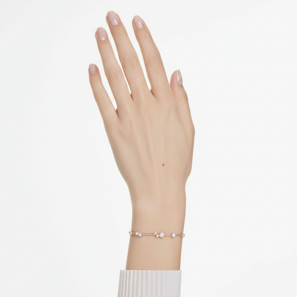 Swarovski Constella tennis bracelet with clear crystal pearls and round cuts in rose gold plating, elegant jewelry accessory.