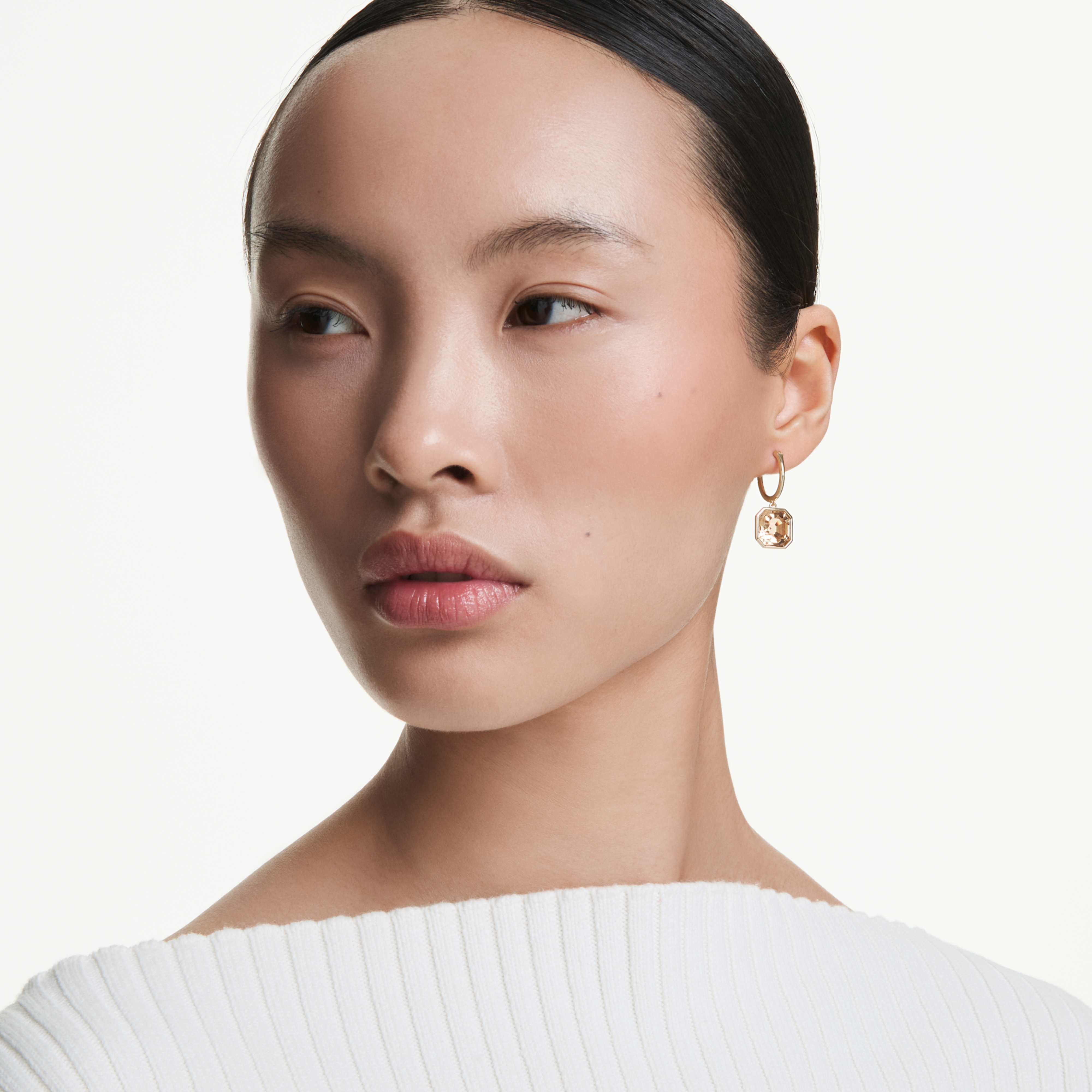 Swarovski Millenia drop earrings with square caramel crystals and gold-tone plating, elegant jewelry with sparkling crystal details.