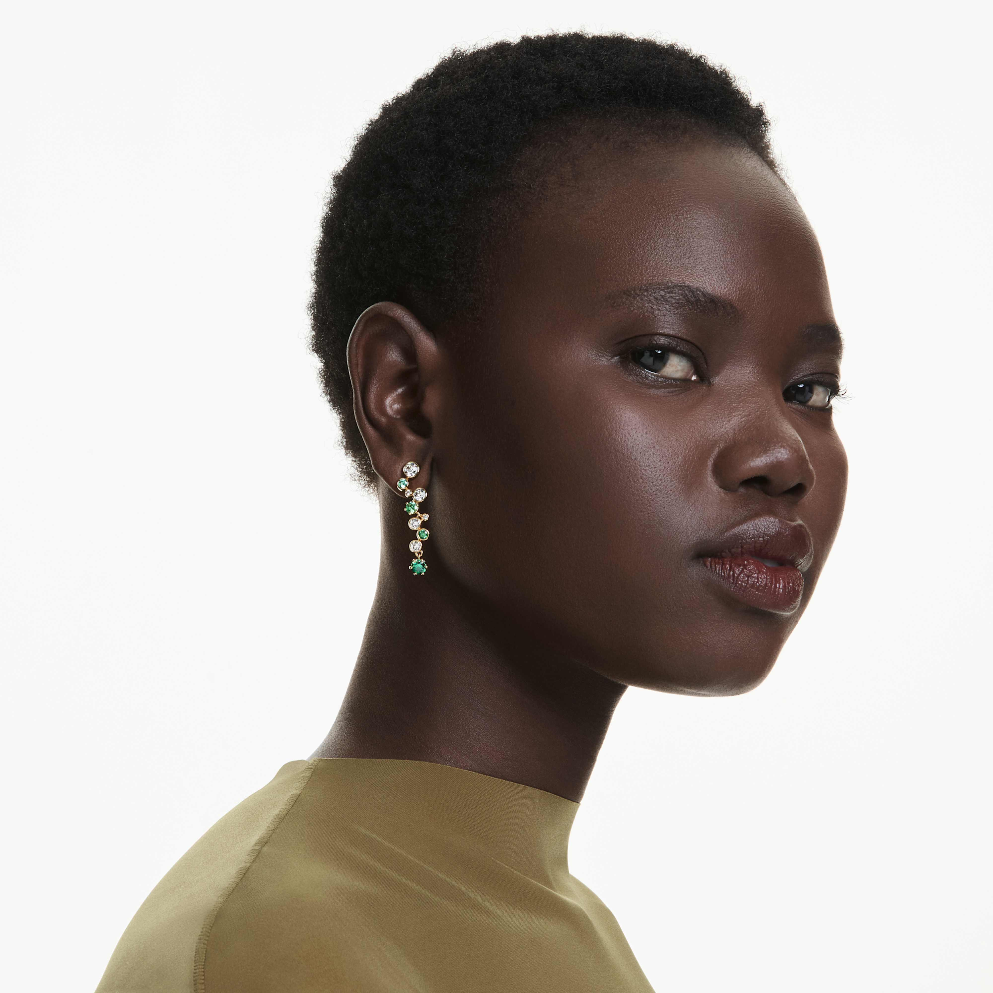 Swarovski Constella Drop Earrings with mixed green cuts and gold-tone plating, featuring sparkling crystal dangles.