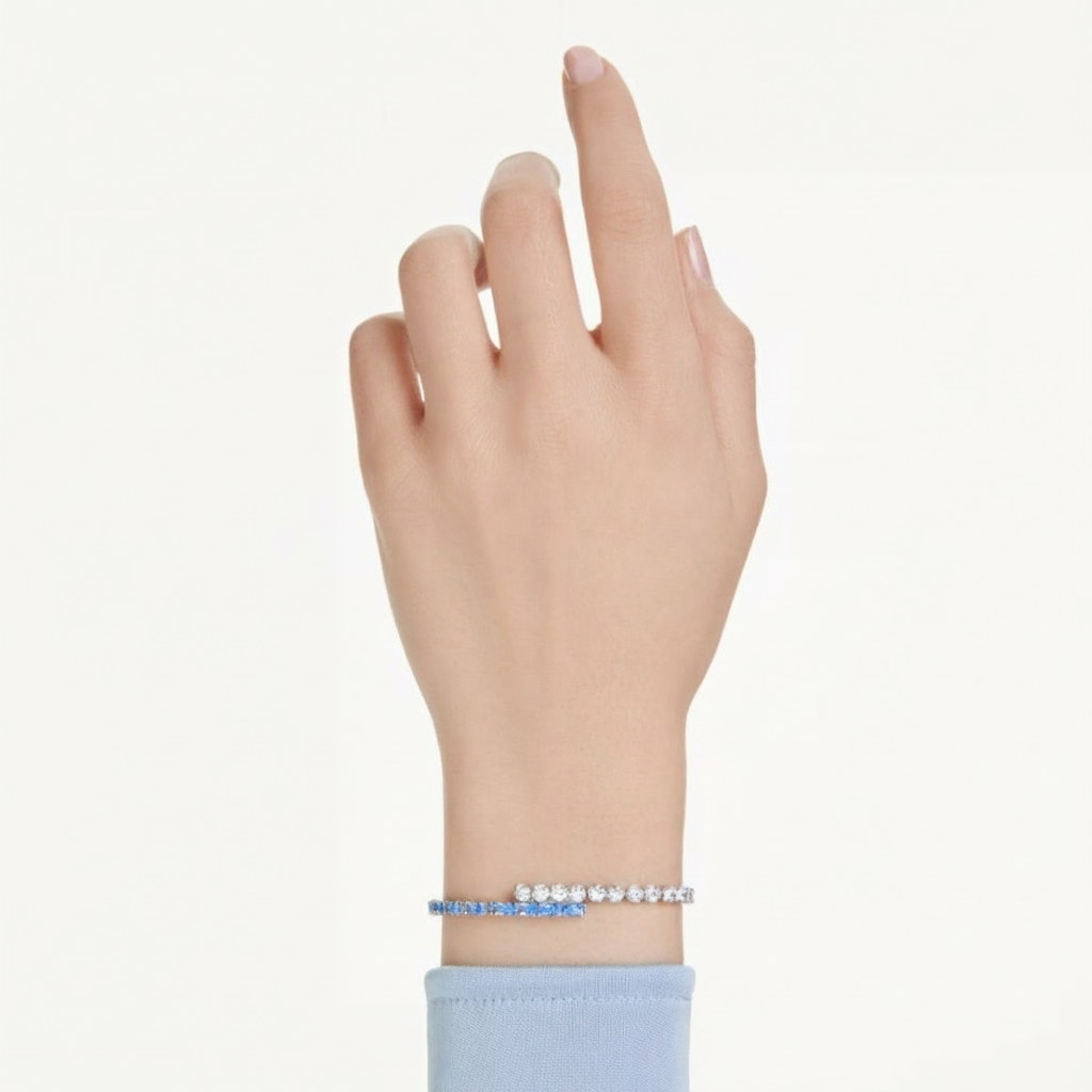 Swarovski Matrix bracelet featuring sparkling crystal geometric design and silver-tone chain on a white background.