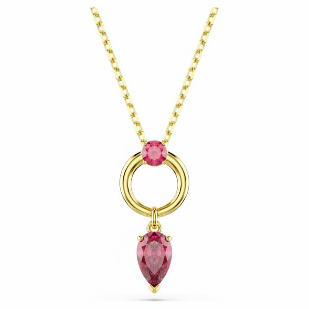 Swarovski Mesmera pendant with mixed-cut red crystals, gold-tone plated, hanging on a delicate chain.